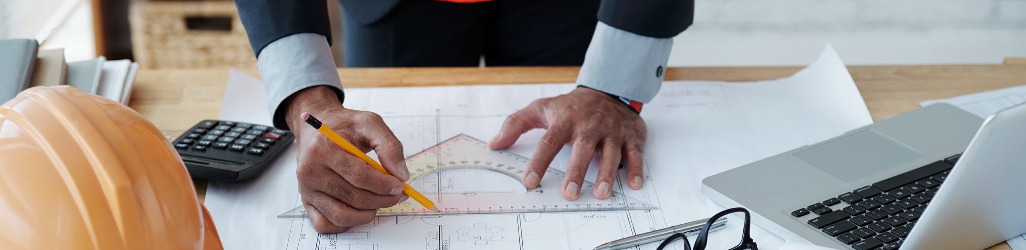 Cropped image of engineer drawing construction plan
